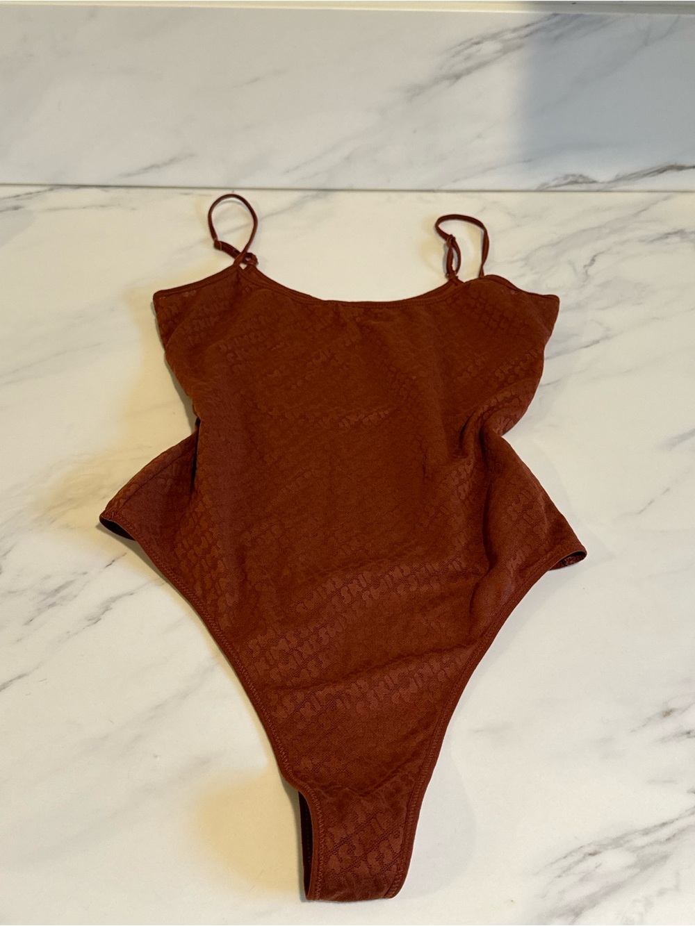 Skims orange mesh sheer logo bodysuit